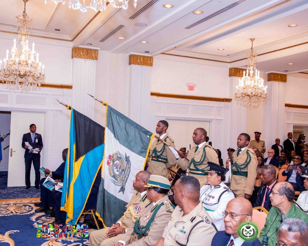 Colour party with the Bahamas and correctional service flags